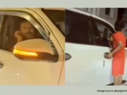 Ujjain SUV stunt: Father lets 9-year-old hang outside Ujjain SUV stunt: 9-year-old hanging outside a moving SUV at night while police intervene